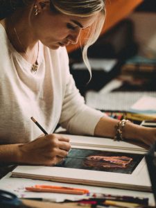 about 01 225x300.jpg